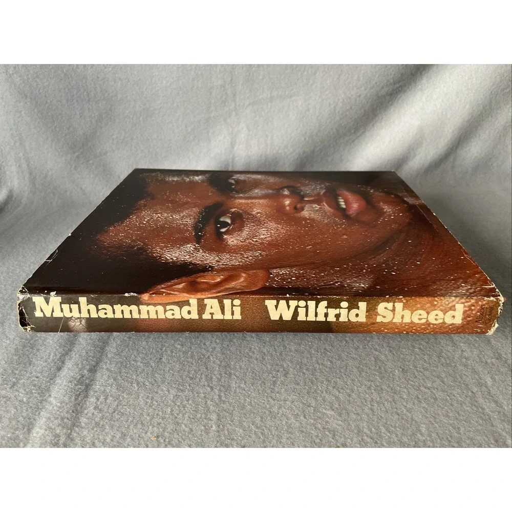 Muhammad Ali: A Portrait in Words and Photographs by‎ Wilfrid Sheed ** Read**
